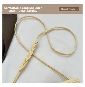 Close-up of a cream-colored PU leather shoulder strap with intricate braided detail