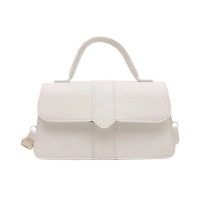 Chic white leather handbag with top handle and adjustable shoulder strap for women