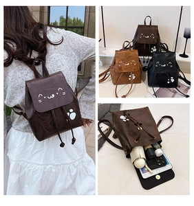 Interior view showing the large capacity of the cartoon cat face mini faux leather backpack