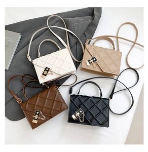 Quilted crossbody bag collection in black, white, brown, and beige with chain locks