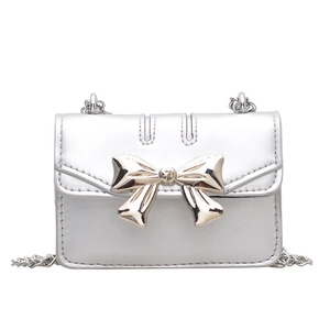 Chic silver bow mini crossbody chain bag with metallic finish and bow detail