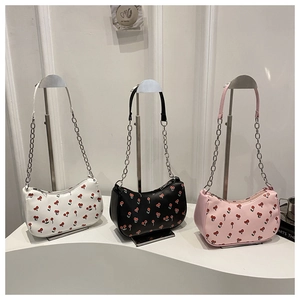 Chic half-moon underarm bags in black, white and pink with red cherry patterns and chain straps