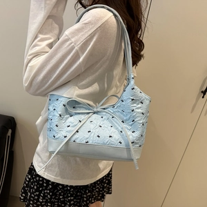 Blue ruffled hobo bag with floral embroidery and ribbon bow for stylish women's commuting