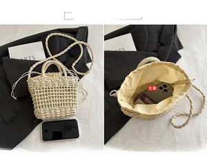 Detail view of woven straw bag showing hollow mesh texture and drawstring inner pouch