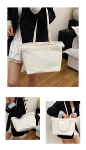 Detail of white lace trim on a minimalist canvas tote bag with Evea Glow lettering