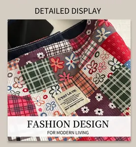 Detail of ethnic patchwork tote bag with corduroy texture and C'EST LA VIE label