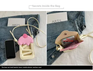 Detailed interior of cupcake shaped crossbody bag showing capacity for phone and lipstick