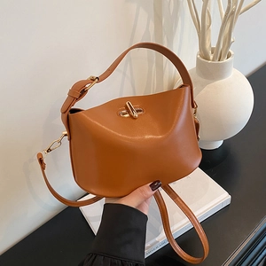 Minimalist PU Leather Bucket Bag For Women Gold Metal Lock Handbag Solid Color Adjustable Shoulder Strap Commuting Crossbody Bag
