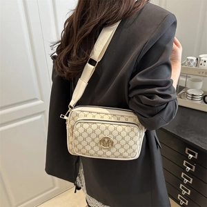 Vintage canvas crossbody bag with letter pattern and adjustable wide strap for women