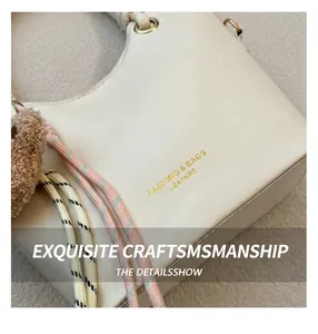 Detail of cream leather handbag featuring gold logo text and colorful woven rope decor
