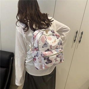Fashionable nylon backpack with butterfly prints and gold metal zippers for women