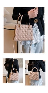 Detailed view of beige quilted handbag with elegant diamond stitching and dual handles
