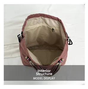 Detail of spacious tote interior with zipper pocket and dual slot compartments