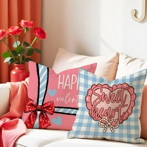Valentine's Day pillow covers with bow and heart designs on a cozy sofa setting