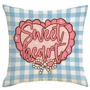 Blue gingham heart pillowcase with Sweet Heart print and pearl bow detail on white background