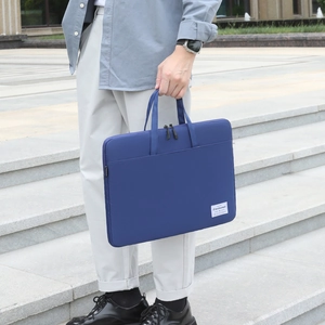 Navy blue business laptop bag with dual handles and front pocket for 15.6 inch laptop