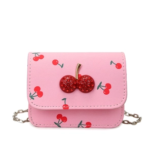 Pink mini crossbody bag with cherry prints, sparkling rhinestone charms and silver chain strap