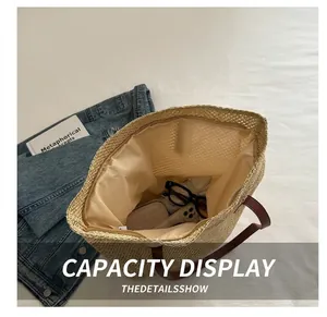Top view of woven straw tote bag interior showing spacious capacity for daily essentials