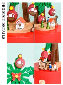 Détails d'une boîte à musique en bois avec sapins de Noël et petites cabines rouges