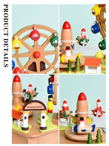 Detailed close-up of the wooden ferris wheel music box with colorful hand-painted festive scenes