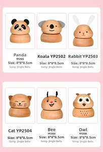 Detailed view of six animal-shaped wooden music boxes including panda and koala models