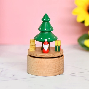 Mini carillon in legno di faggio con albero di Natale e statuina su base tonda