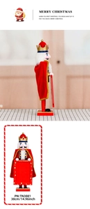 Detail of 38cm wooden nutcracker king with Merry Christmas sign and red velvet cloak