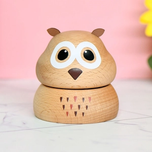 Handcrafted owl wooden music box with natural grain and colorful geometric patterns