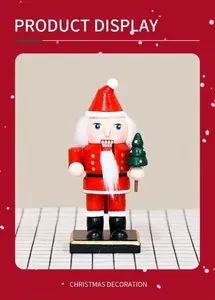 Close-up of a 16cm wooden Santa Claus nutcracker figurine with a mini green Christmas tree
