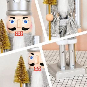 Figurine soldat casse-noisette argentée avec éclairage LED et sapin doré musical