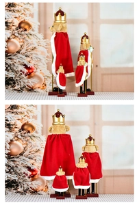 Rear view of four teddy bear nutcrackers wearing red velvet capes and golden crowns