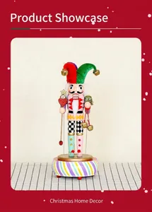Close-up of a circus clown nutcracker music box with gold bells and star scepter detail