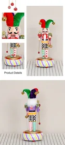 Macro shot of colorful Nutcracker clown music box details and painted wooden base