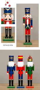 Detail view of the colorful 38cm wooden nutcracker featuring movable lever and crown