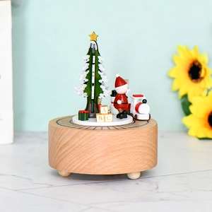 Wooden Christmas music box with Santa, mini train and tree on revolving base