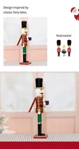 Detail of a 60cm wooden Nutcracker soldier with plaid uniform and blue gift box ornament