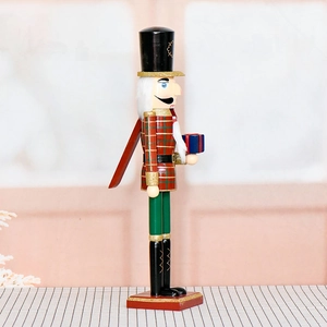 Classic 60cm wooden Nutcracker soldier in red plaid suit holding a blue gift box