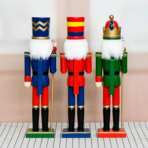 Three 38cm wooden Christmas nutcracker soldier dolls in red, green and blue colors