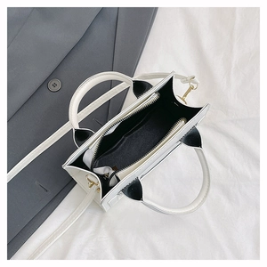 Top view showing the large interior compartment and zip pocket of the cat ear tote bag