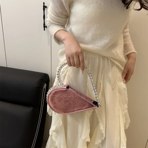 Sparkling pink heart-shaped evening clutch bag with crystal handles for women