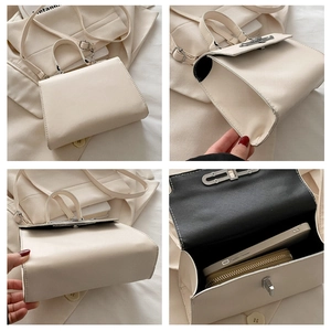 Detail view of cream-colored retro square handbag showing silver buckle and adjustable strap