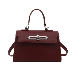 Burgundy minimalist handbag with silver rectangular lock and adjustable shoulder strap