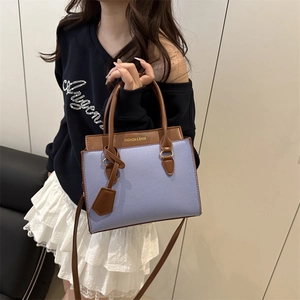 Chic periwinkle and brown contrast handbag with litchi texture and adjustable strap