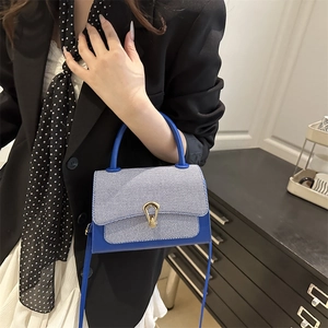Blue lychee leather and striped fabric small square handbag with golden water-drop lock