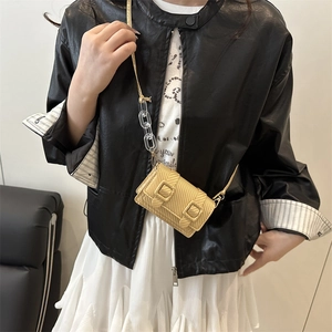Fashionable golden woven mini crossbody bag for women in 2025 trendy street style