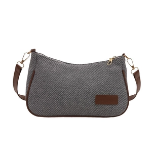 Vintage gray herringbone underarm bag with brown leather trim and golden metal buckles