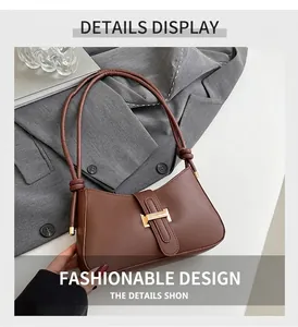Détail d'un sac bandoulière en cuir marron avec fermoir H doré et sangle à nœuds