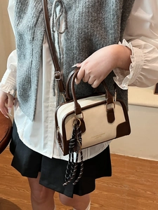 Retro colorblock Boston handbag in cream and brown PU leather with a woven charm