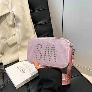 Pink sequin camera bag with silver SIM rivets and wide shoulder strap for women