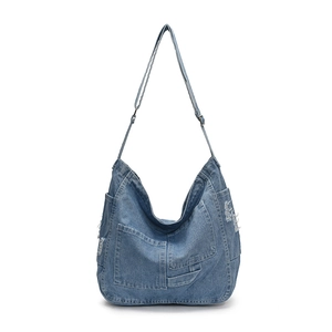 Retro denim blue tote bag with large front pocket and adjustable shoulder strap